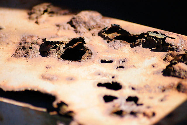 Rust Holes I &copy; Dennis Mojado