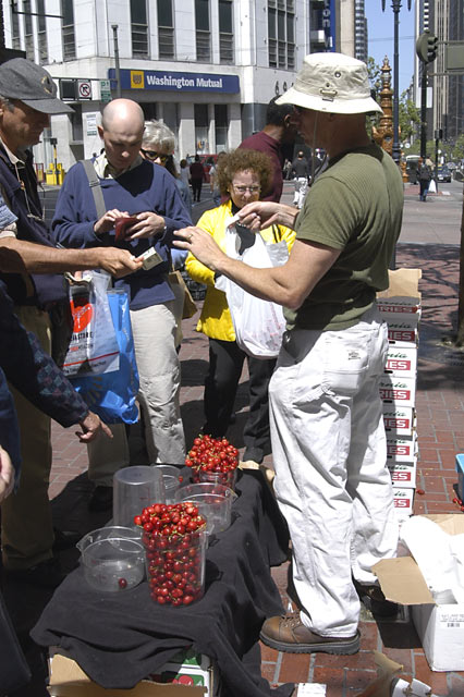 Selling Cherries on Market St. &copy; Dennis Mojado